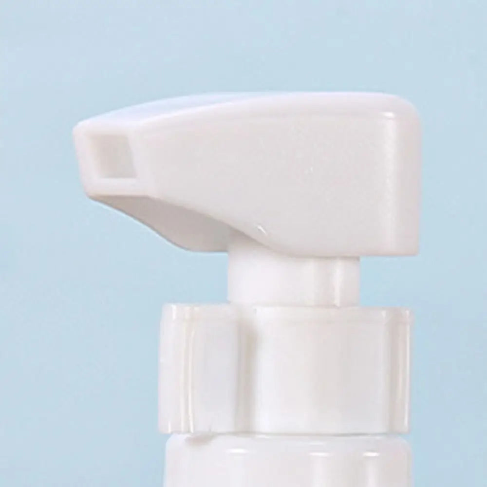 4-in-1 Refillable Travel Bottle Set